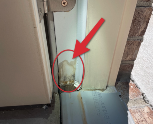 Moisture intrusion at door jamb due to missing or failed sealant