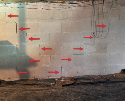 Best Priced Home Inspection Identifying Crack Patterns in Foundation Wall